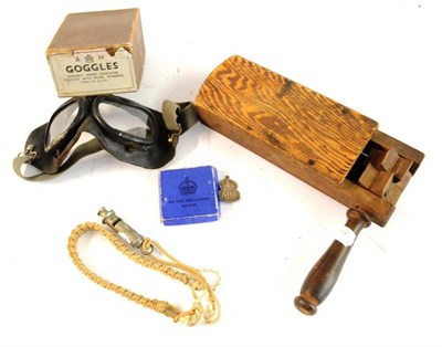 Lot 100 - Second World War Militaria, comprising an ARP rattle, an ARP whistle, a silver ARP badge in box...