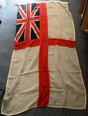 Lot 115 - A British Naval Ensign, of printed sectional linen, with plain triple stitched hoist, 180cm by 95cm