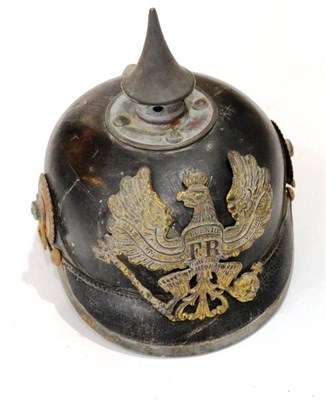 Lot 133 - A Prussian Enlisted Line Infantry Pickelhaube, with black leather skull, non-detachable spike...