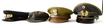 Lot 145 - A Post Second World War Polish Army Officer's Peaked Cap, in khaki with silver bullion thread...