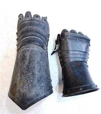 Lot 152 - An Early 17th Century Gauntlet, the hinged knuckle plate with raised diagonally incised reinforcing