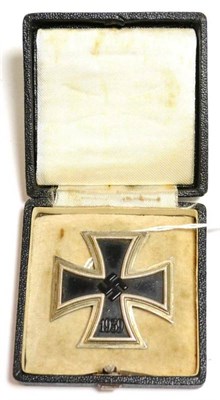 Lot 169 - A German Third Reich Iron Cross First Class, the sword shape pin stamped 26, in case of issue