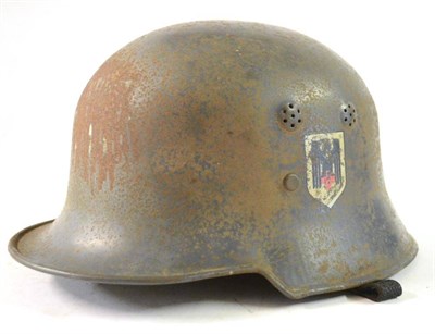 Lot 178 - A German Third Reich M43 Red Cross Double Decal Helmet, re-issued from the RLB (front decal...