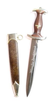 Lot 193 - A German Third Reich SA Dagger, the double edge steel blade etched Alles fur Deutschland and...