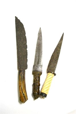 Lot 220 - A Medieval Rondel Dagger, with 18.5cm single edge steel blade, circular guard and later cream...