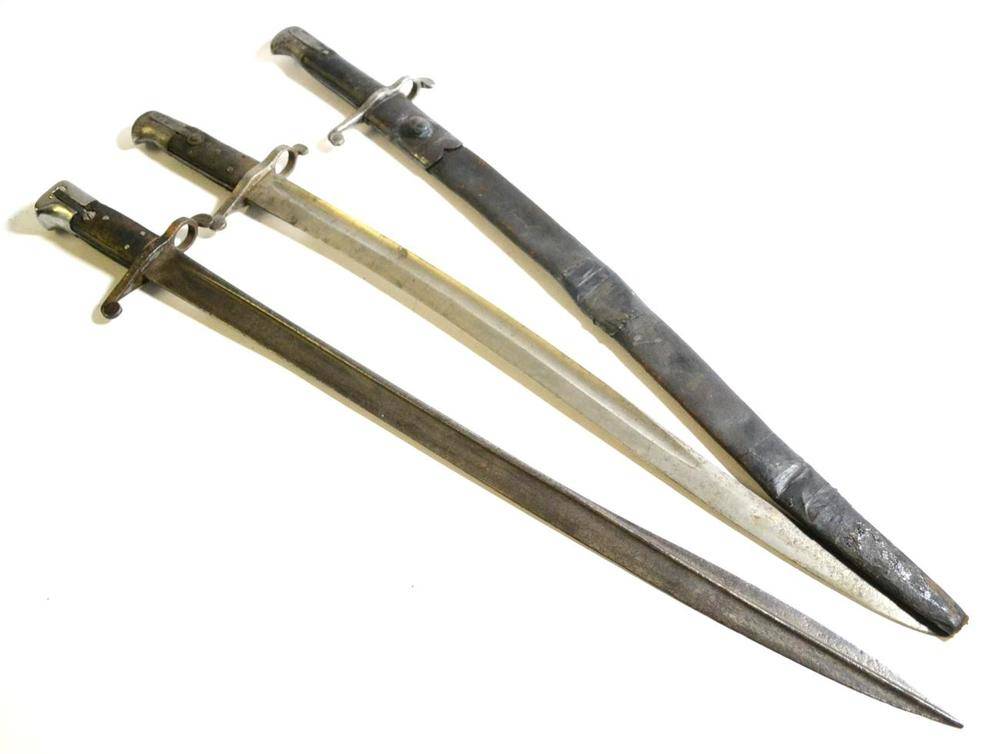 Lot 234 - Two British 1856 Pattern Sword Bayonets, one with steel mounted leather scabbard; a Similar...