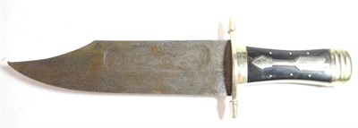 Lot 244 - A Massive Indian Bowie Knife, with 30.5cm broad hatchet tip damascus steel blade, the nickel plated