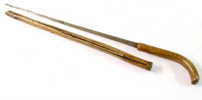 Lot 248 - A 19th Century Bamboo Sword Cane, with 65cm single edge fullered steel blade, plain curved...