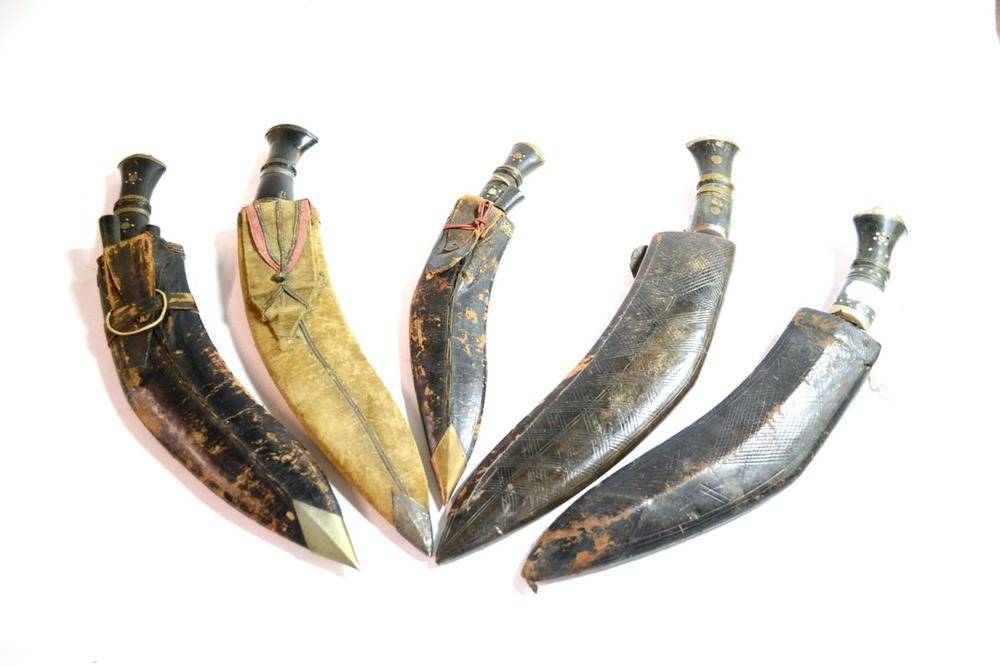 Lot 286 - A Nepalese Kukri, with silver mounted horn grip and gold velvet covered scabbard; four Various...