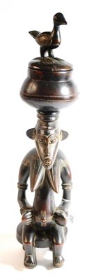 Lot 297 - A Senufo, Ivory Coast Fertility Figure/Bowl, as a seated woman with pendulous breasts and...