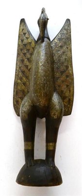 Lot 309 - A Senufo Carved Wood Figure of a Bird, Ivory Coast, standing with arched neck and wings...