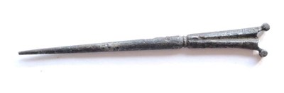 Lot 318 - A 17th Century Steel Bodkin (Gun Cleaning Needle), of stiletto form with flat fluted gunstock...