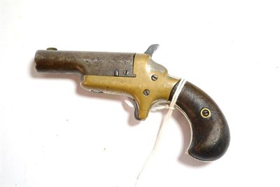 Lot 410 - A Colt No.3 Rimfire Deringer, the 6.3cm steel barrel stamped -COLT-, and swivelling sideways...