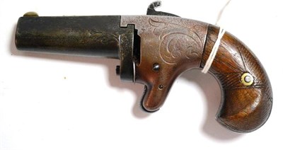 Lot 421 - A National Arms Co. .41 Calibre Rimfire Deringer, the 5.5cm steel barrel with pyramid shape top...