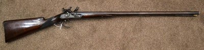 Lot 433 - An 18th Century Double Barrel Flintlock Sporting Gun by Hampton, the 76cm steel barrels engraved at