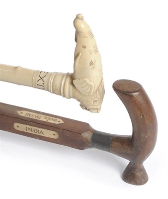 Lot 359 - An Indian Colonial Carved Elephant Ivory Walking Stick, C W Hext, circa 1905-10, the grip as a...