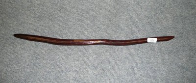 Lot 373 - An Australian Fighting Stick or Spear Thrower, the slightly undulating hardwood body with...