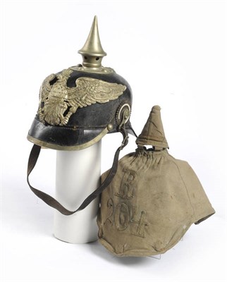 Lot 374 - A First World War German Leather Pickelhaube, the nickel plated conical detachable spike unscrewing