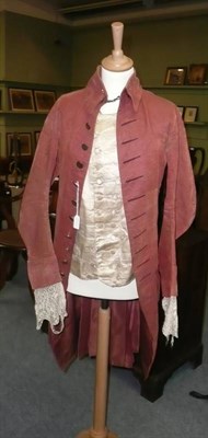 Lot 387 - An 18th Century Gentleman's Silk Frock Coat with lace trimmed cuffs and brass buttons, cream...