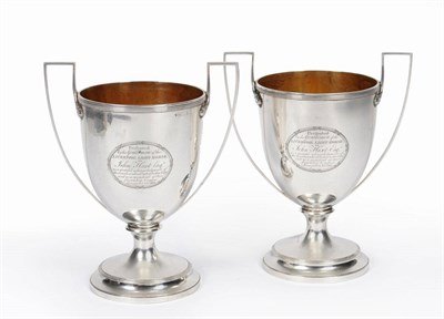 Lot 388 - A Documentary Pair of George III Cups, William Frisbee, London 1803, the pedestal foot rising...