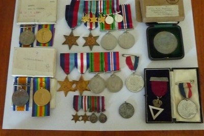 Lot 17 - A Family Group of First/Second World War Medals, comprising two First World War pairs awarded...