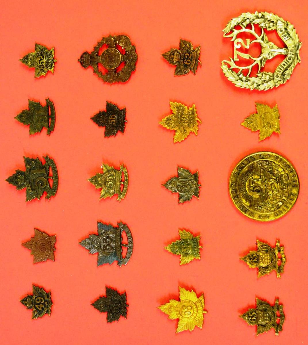 Lot 31 - A Collection of Twenty First World War Canadian Cap and Collar Badges, in bronze, brass and...