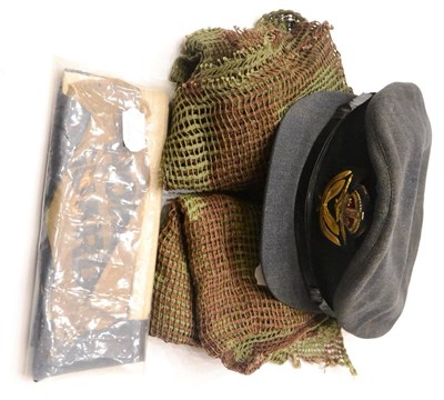 Lot 97 - A Second World War RAF Peaked Cap, in blue wool, with gold bullion embroidered cap badge to the...