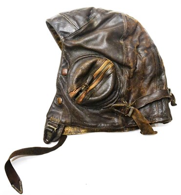 Lot 98 - A Second World War RAF Type B Leather Flying Helmet, with zipped ear pieces, the suede lining...