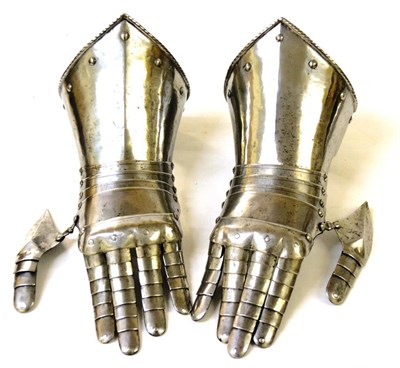 Lot 110 - A Pair of 17th Century Italian Style Steel Gauntlets, each with articulated finger and thumb...