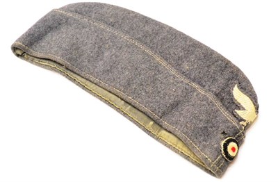 Lot 131 - A German Third Reich Luftwaffe EM/NCO's Overseas Cap, in blue/grey wool and rayon blend, with...