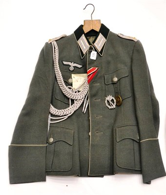 Lot 135 - A German Third Reich Field Service Tunic to an Obertleutnant of the 27th Infantry Regiment, in...