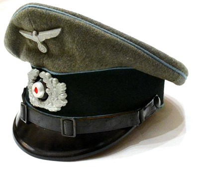 Lot 139 - A German Third Reich Medical Corps EM/NCO's Visor Cap, in field grey wool and rayon blend, with...