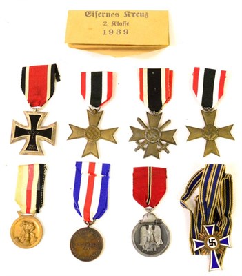 Lot 146 - German Third Reich Items:- an Iron Cross, second class, with envelope; a Mother's Cross, bronze...