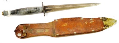 Lot 233 - A Second World War 3rd Pattern Commando Knife, with machine forged steel blade, the crossguard...