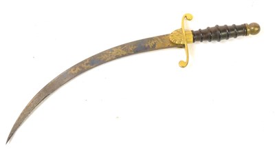 Lot 238 - A Georgian Naval Dirk, the 25cm single edge curved blued steel blade engraved and gilt with...