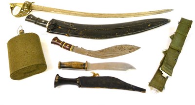 Lot 249 - An Indian Large Kukri, the chromium plated steel blade punched with leaves, with horn grip and...