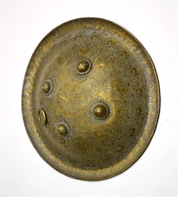 Lot 277 - A 19th Century Indian Brass Dhal Shield, of convex circular form, the whole engraved with panels of