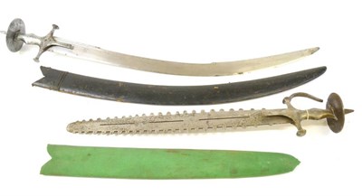 Lot 302 - A 19th Century Indian Talwar Type Short Sword, the 46cm double edge ";saw fish"; type blade pierced