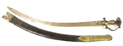 Lot 311 - A 19th Century Indian Talwar, the 76.5cm single edge curved steel blade with three narrow...