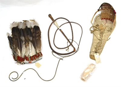 Lot 322 - An Early 20th Century Southern Plains Indian Eagle Feather Headdress, the felt cap with...