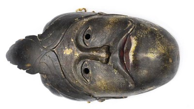 Lot 328 - A 19th Century Indian Char Pugal Dark Stained Wood Mask, of oval form, wearing a turban with...