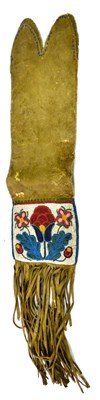 Lot 334 - A Mid-19th Century Cree Indian Hide Tobacco Pouch, the thread sewn seams edged with clear glass...