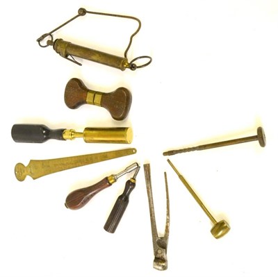 Lot 398 - Accessories, including a 12 bore chamber brush by W Evans, Pall Mall, with brass tubular case...