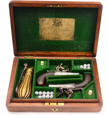 Lot 462 - A Pair of 19th Century Flintlock Pocket Pistols, the 3cm turn-off steel barrels with Birmingham...