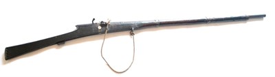 Lot 511 - A 19th Century Indian Matchlock Long Gun, the 114.5cm four stage steel barrel with deep fluting...