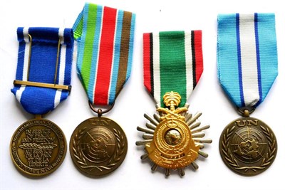 Lot 29 - Four Medals comprising Saudi Arabian Medal for the Liberation of Kuwait; NATO Service Medal,...