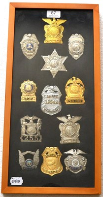 Lot 87 - A Collection of Twelve U.S.A. Police Badges, including California, Nevada, Massachusetts, Michigan