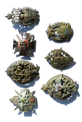 Lot 103 - Seven Various Russian Imperial Bronze and Enamel Military Badges, including a Local Troops...