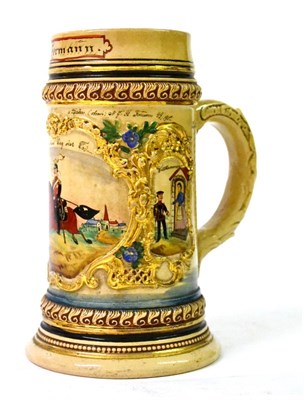 Lot 128 - A Prussian Cream Pottery Beerstein, the rim inscribed `Res. Hermann', the main body moulded...