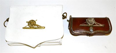 Lot 143 - A Brown Leather Pouch, to the Royal Artillery, the flap with silver lace trim, centrally a silvered